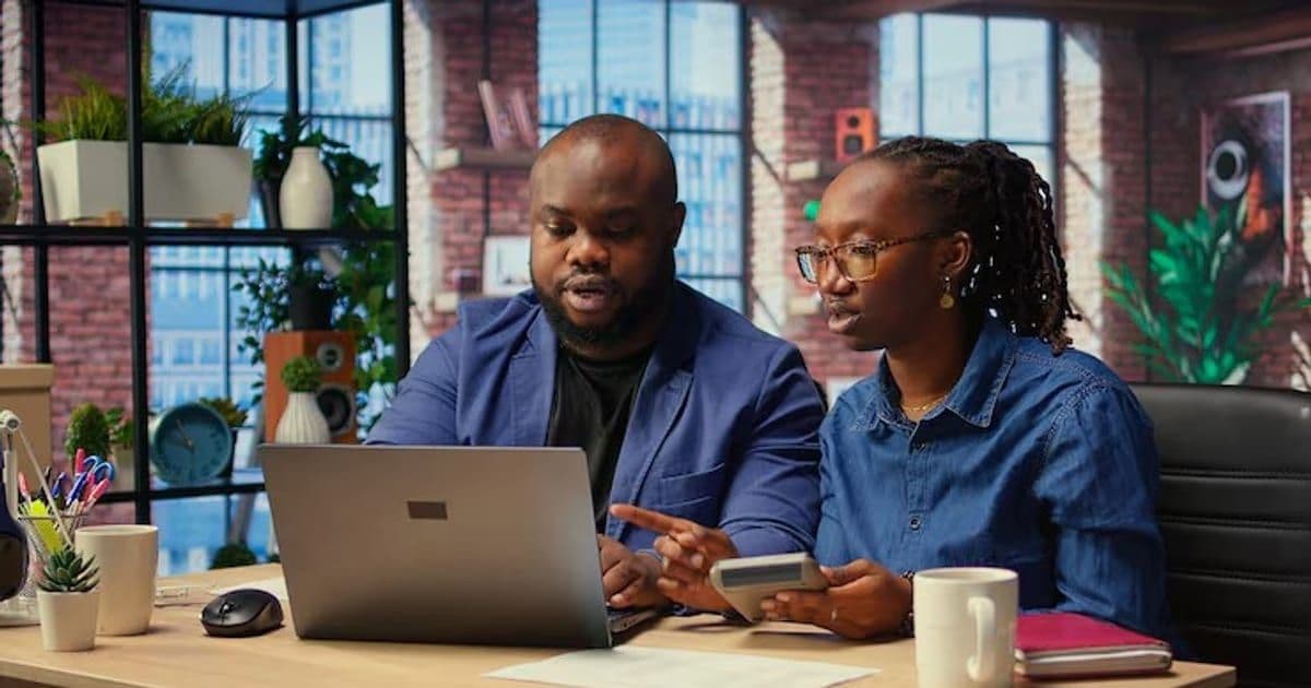 African american couple reviews taxes finances home office